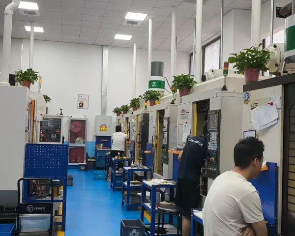 Production floor with operators at LINMI Precision